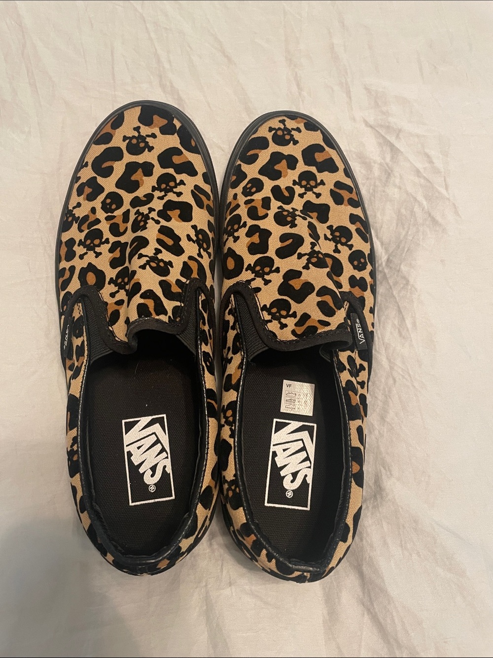 Vans Slip-On Sneakers in Tan and Black Leopard with Skull Motif W9.5/M8